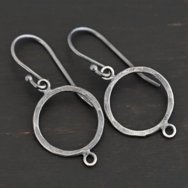 sterling silver Taylor Round Chandelier oxidized hammered with ear wires shown on dark background