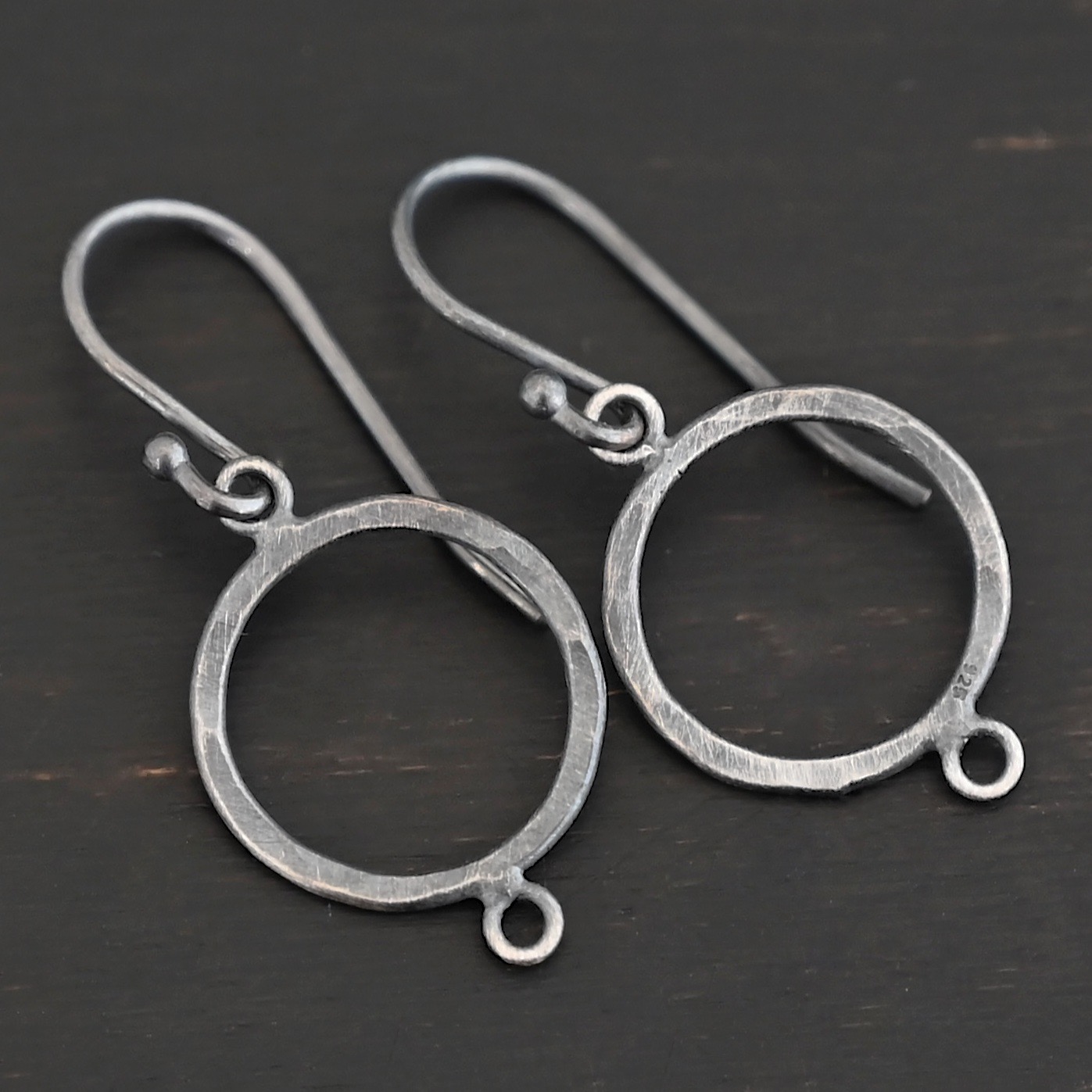 Taylor Round Chandelier oxidized hammered with ear wires sterling silver Taylor Round Chandelier oxidized hammered with ear wires shown on dark background