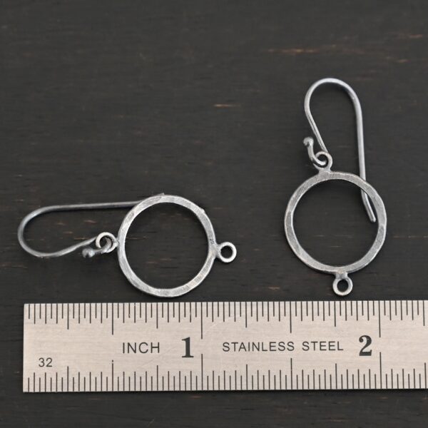 sterling silver Taylor Round Chandelier oxidized hammered with ear wires shown by ruler