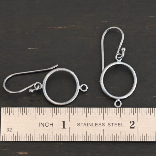 sterling silver Taylor Round Chandelier oxidized smooth with ear wires shown by ruler