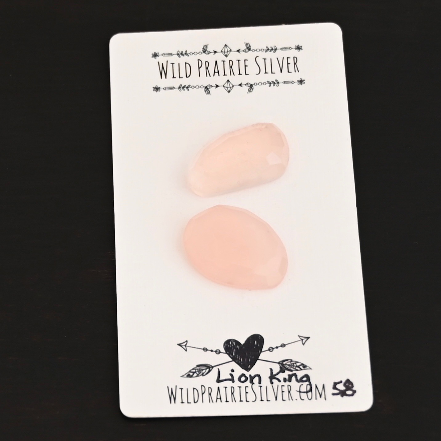 Lion King Rose Cut Rose Quartz Cabochon Parcel shown on business card