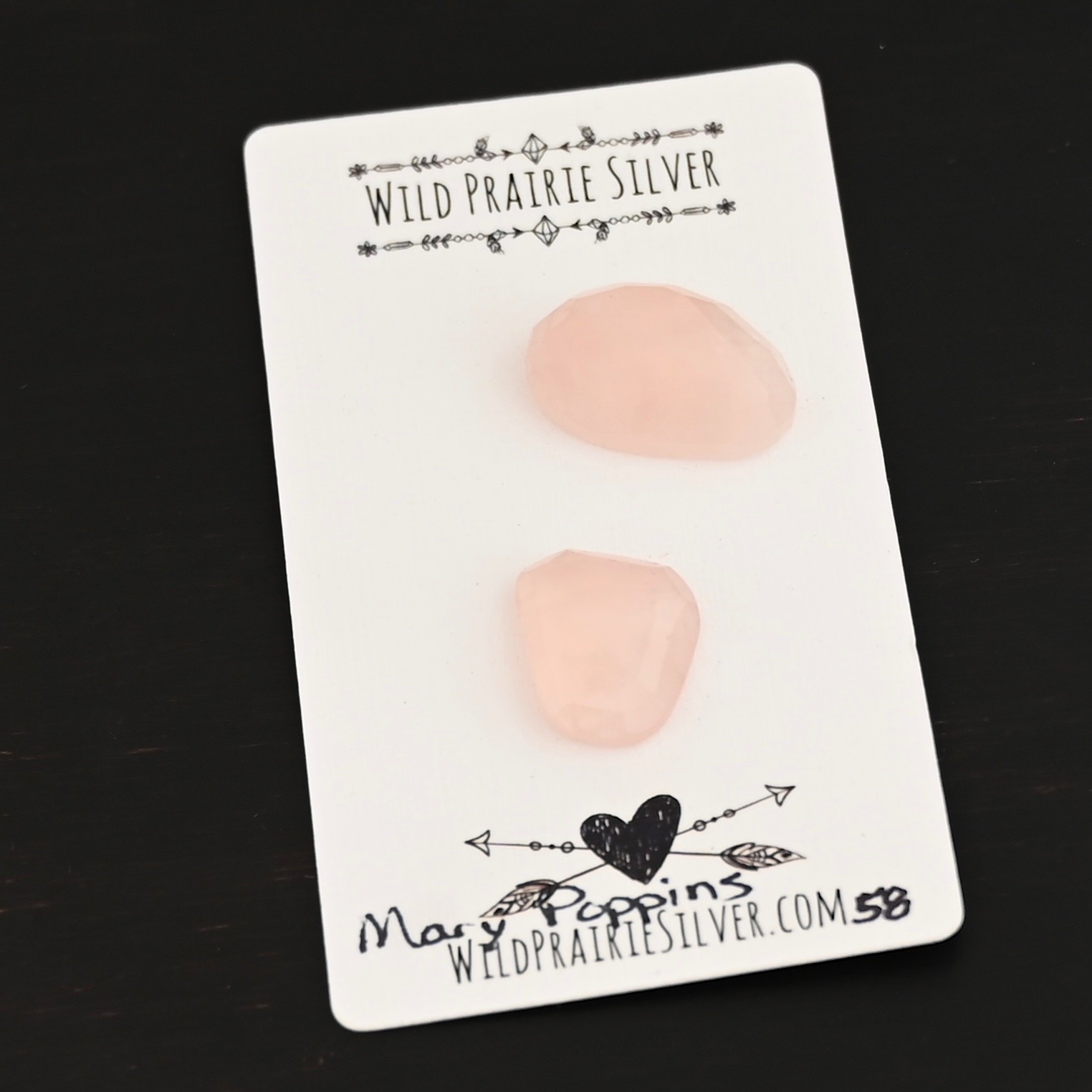 Mary Poppins Rose Cut Rose Quartz Cabochon Parcel shown on business card