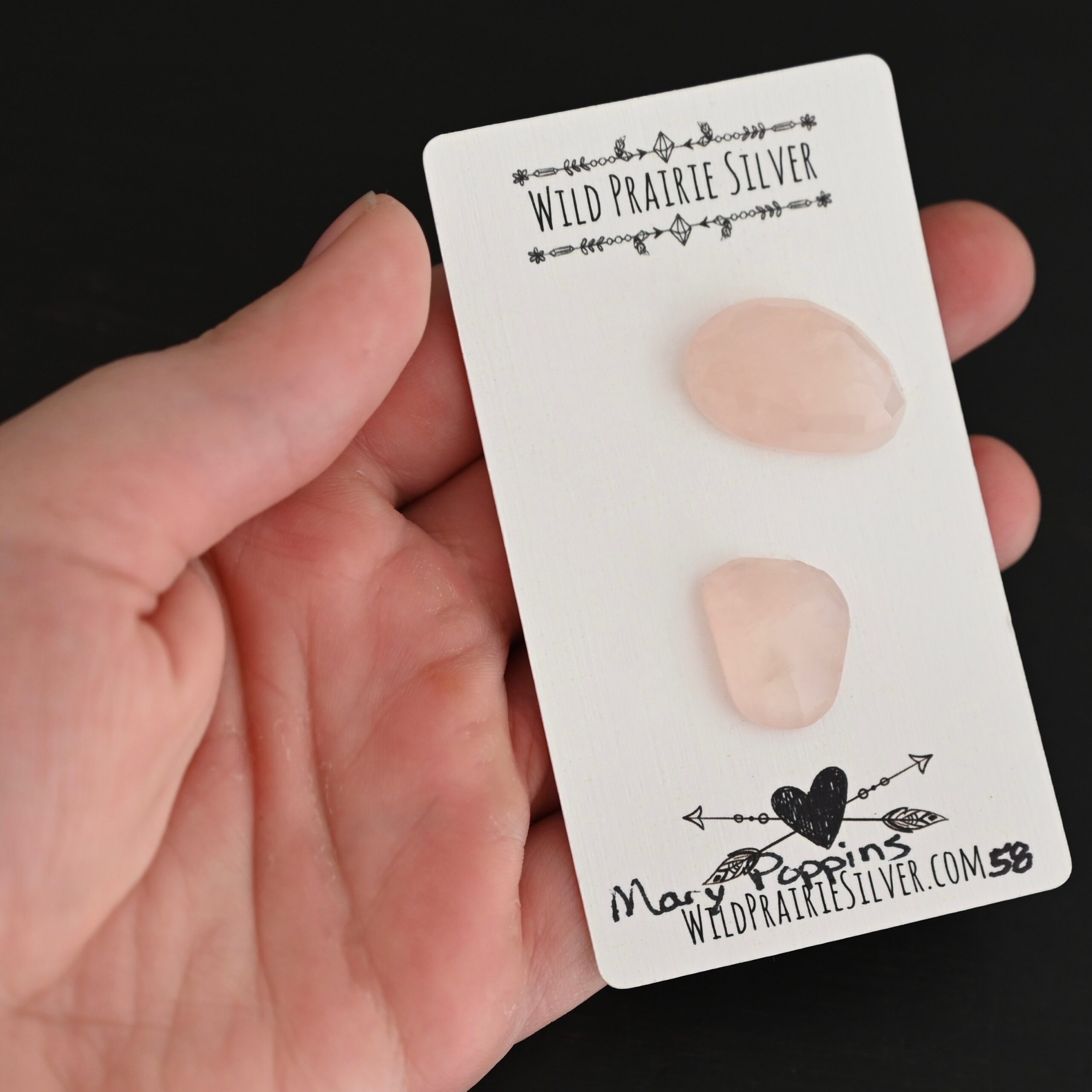 Mary Poppins Rose Cut Rose Quartz Cabochon Parcel shown in hand