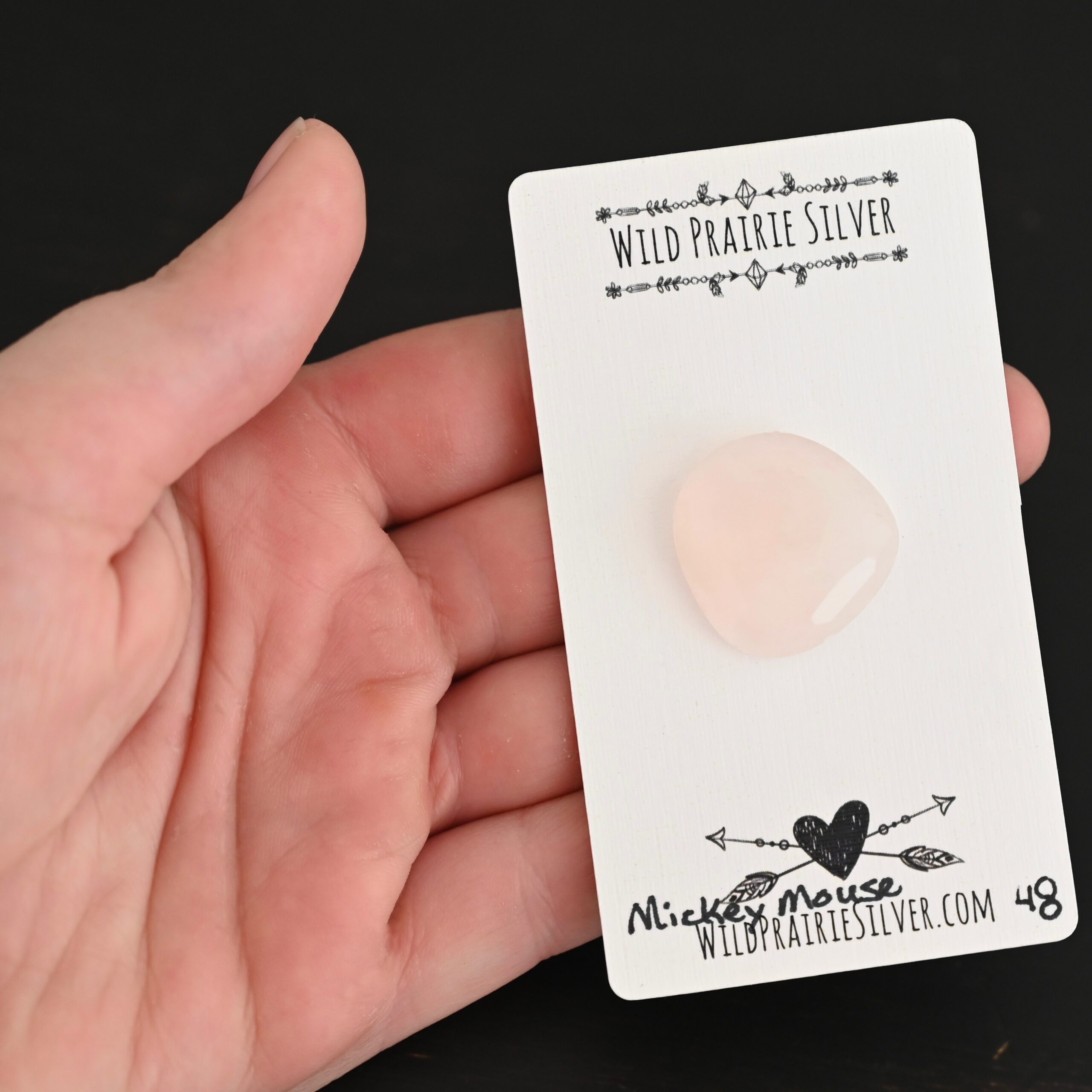 Mickey Mouse Rose Cut Rose Quartz Cabochon Parcel Mickey Mouse Rose Cut Rose Quartz Cabochon Parcel shown in hand