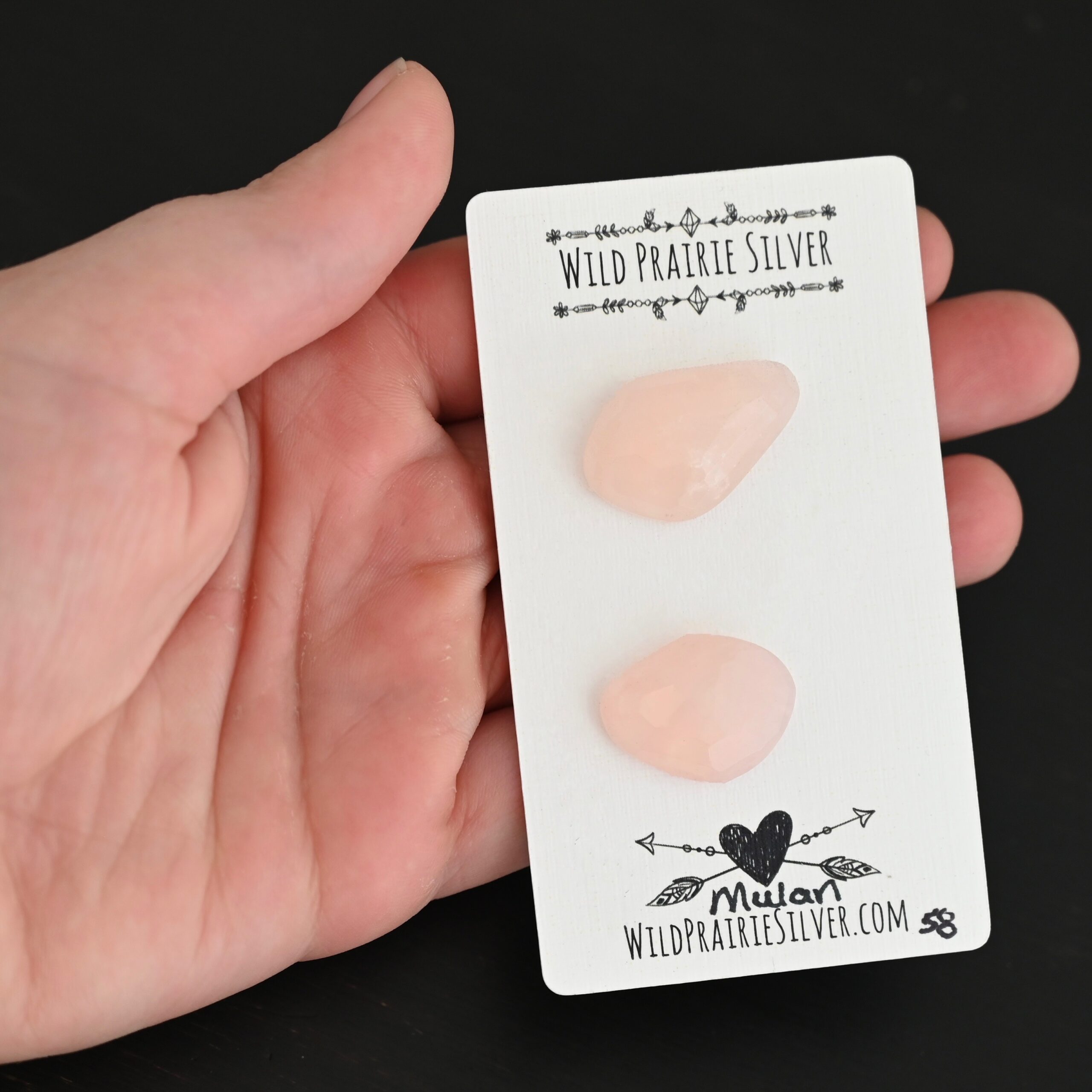 Mulan Rose Cut Rose Quartz Cabochon Parcel Mulan Rose Cut Rose Quartz Cabochon Parcel shown in hand