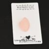 Sleeping Beauty Rose Cut Rose Quartz Cabochon Parcel shown on business card