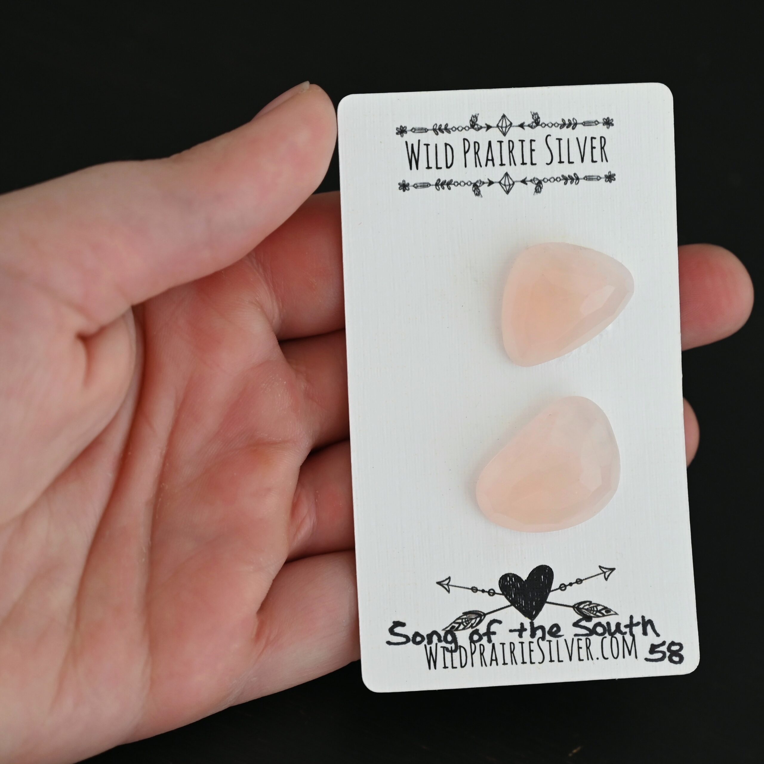 Song of the South Rose Cut Rose Quartz Cabochon Parcel shown in hand