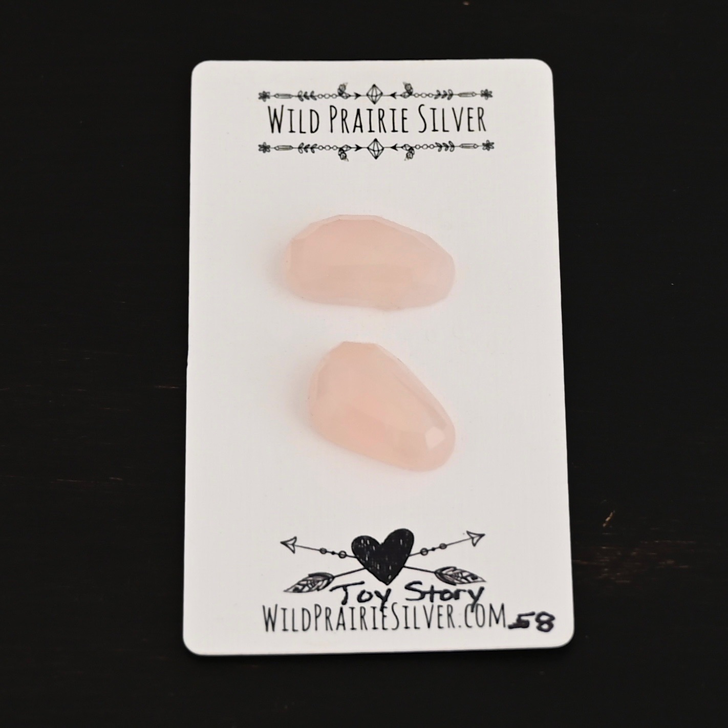 Toy Story Rose Cut Rose Quartz Cabochon Parcel shown on business card