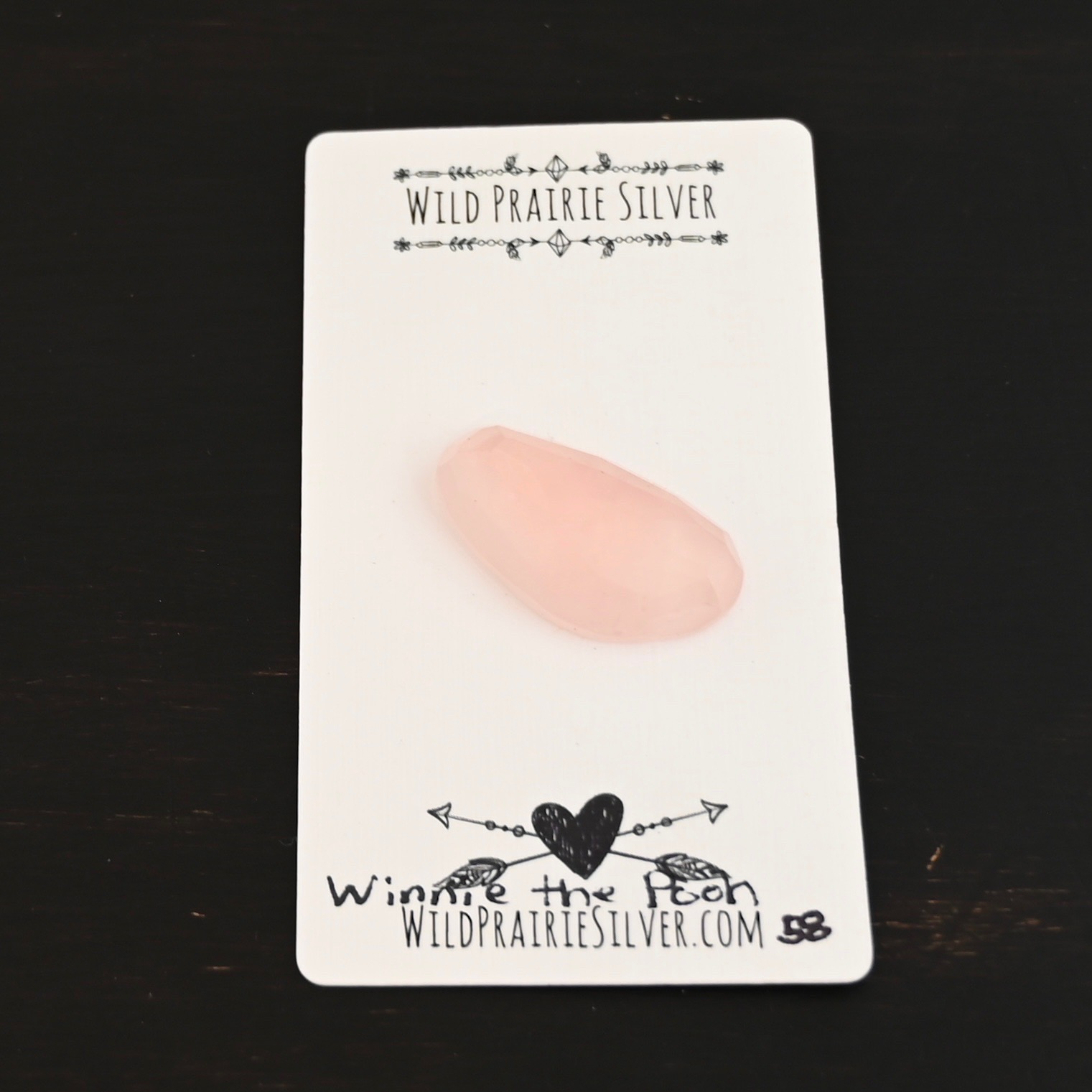Winnie the Pooh Rose Cut Rose Quartz Cabochon Parcel shown on business card