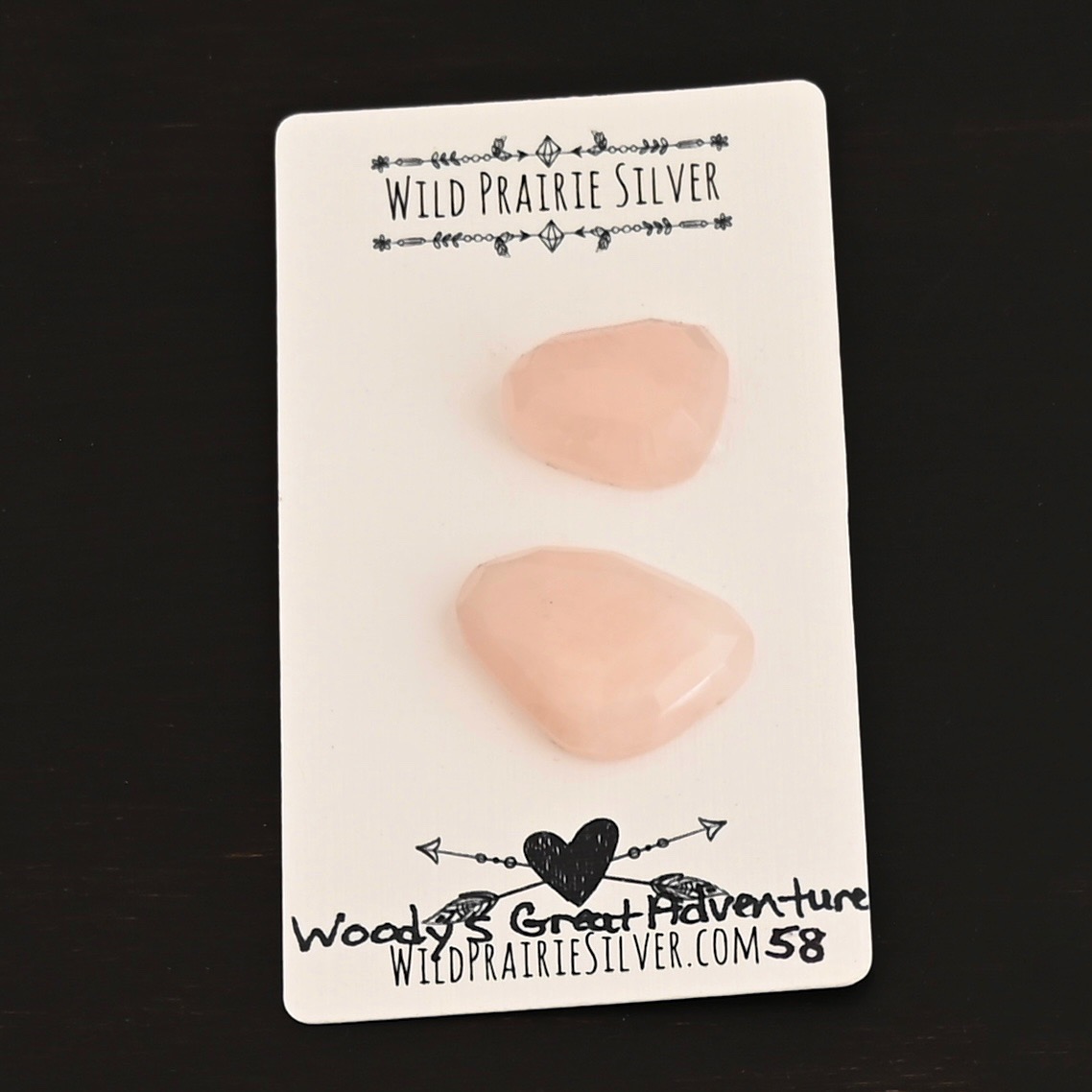 Woodys Great Adventure Rose Cut Rose Quartz Cabochon Parcel shown on business card