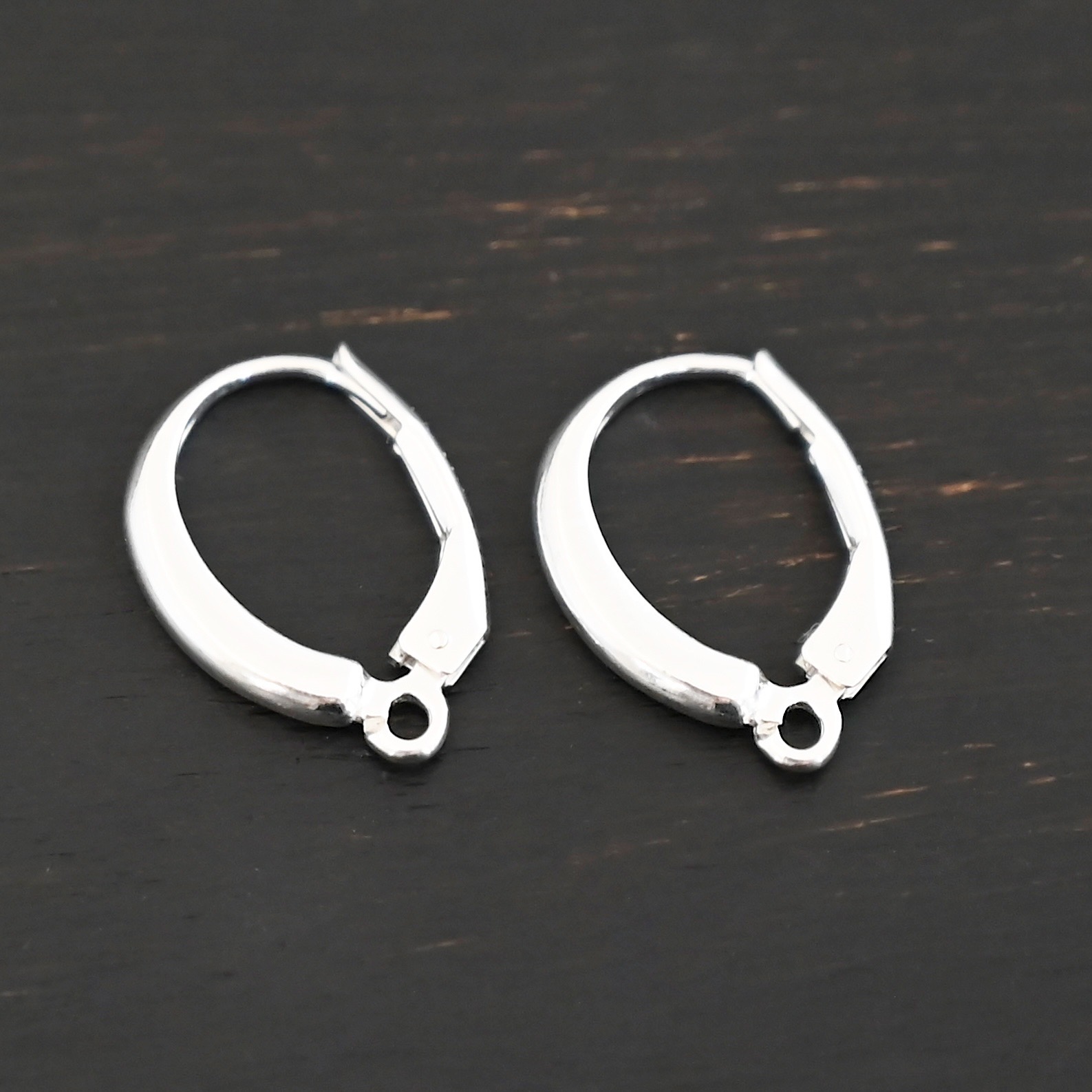 sterling silver Willa lever back ear wires - shiny shown on dark background