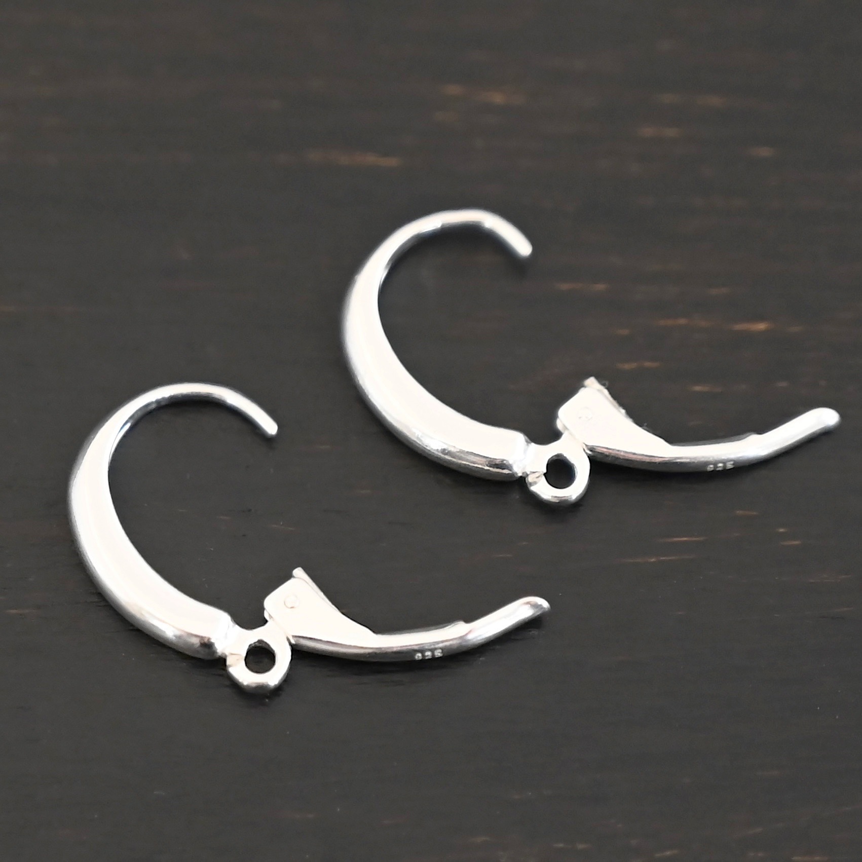 sterling silver Willa lever back ear wires - shiny shown on dark background