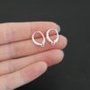 sterling silver Willa lever back ear wires - shiny shown in hand