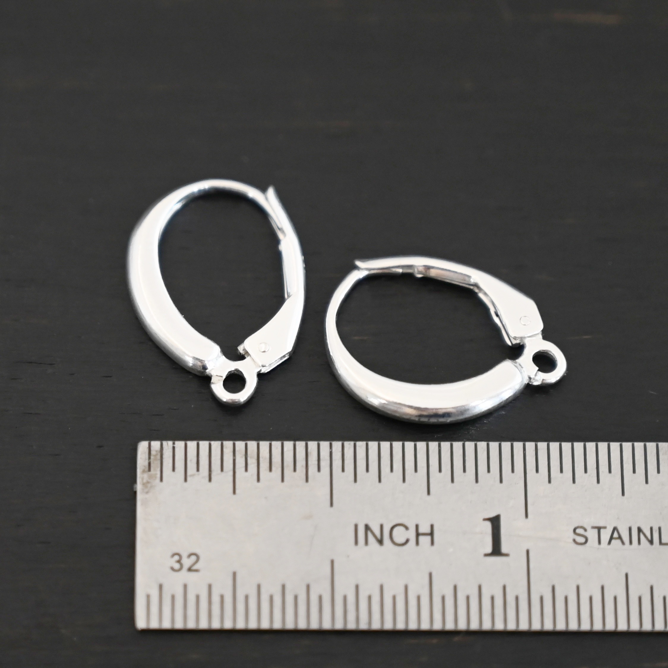 sterling silver Willa lever back ear wires - shiny shown by ruler