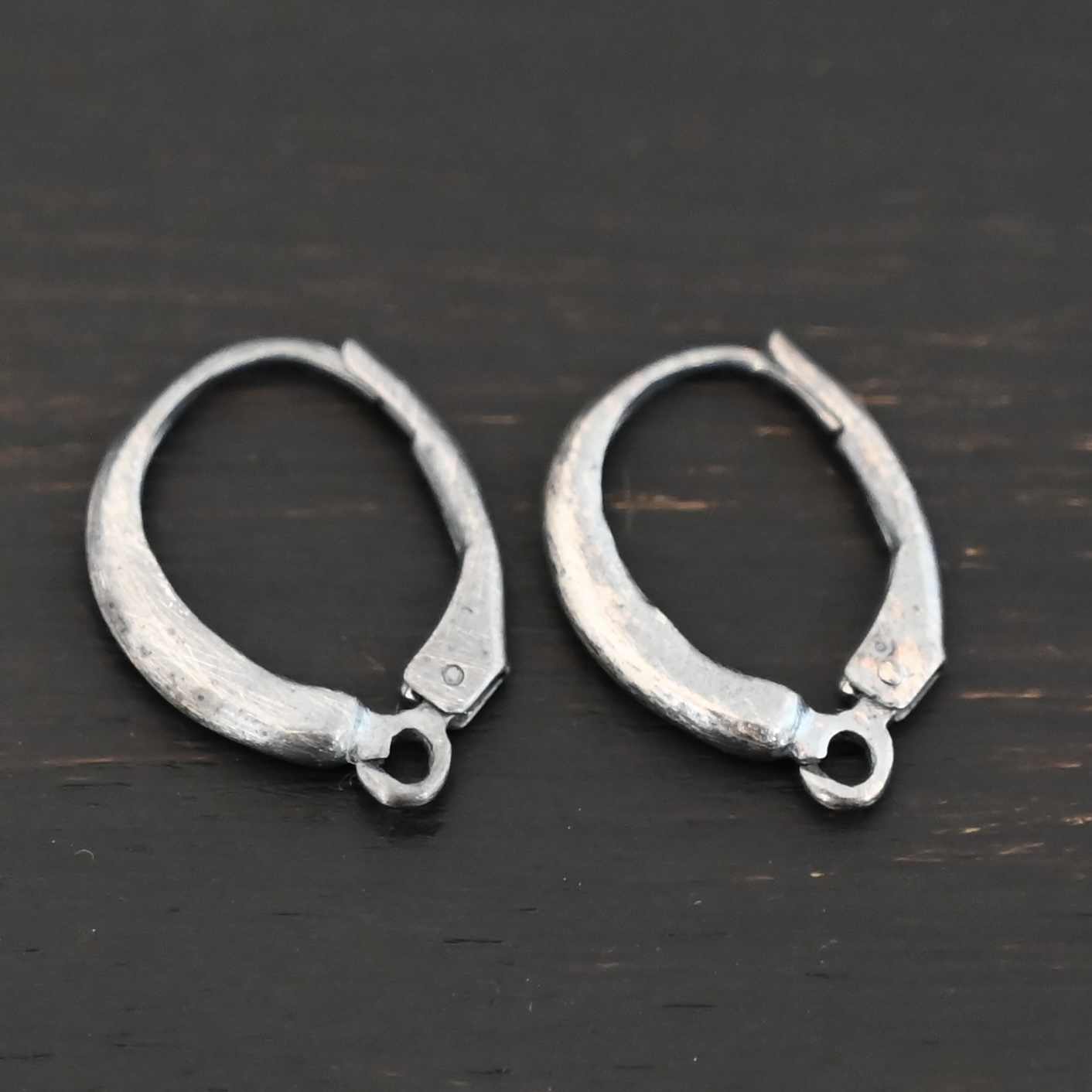 sterling silver Willa lever back ear wires - oxidized shown on dark background