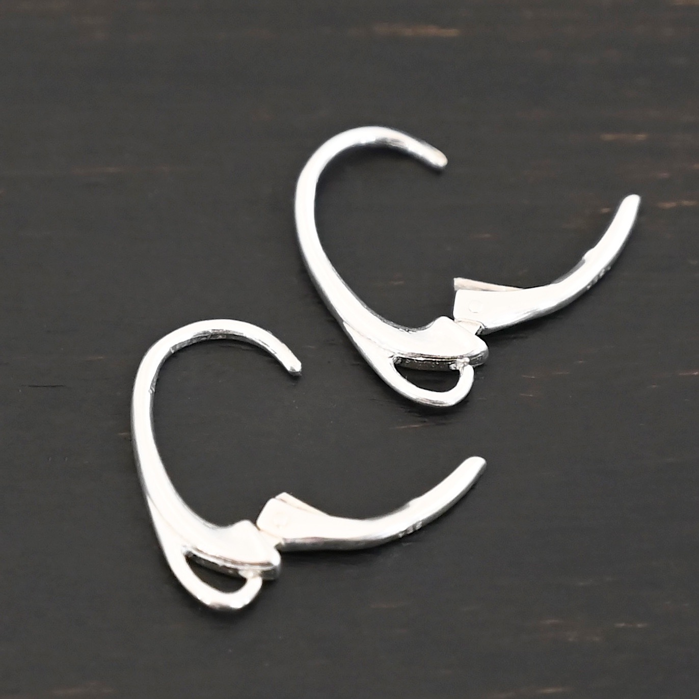 sterling silver Wendy lever back ear wires - shiny shown on dark background