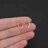 14k gold filled Waverly lever back ear wires shown in hand