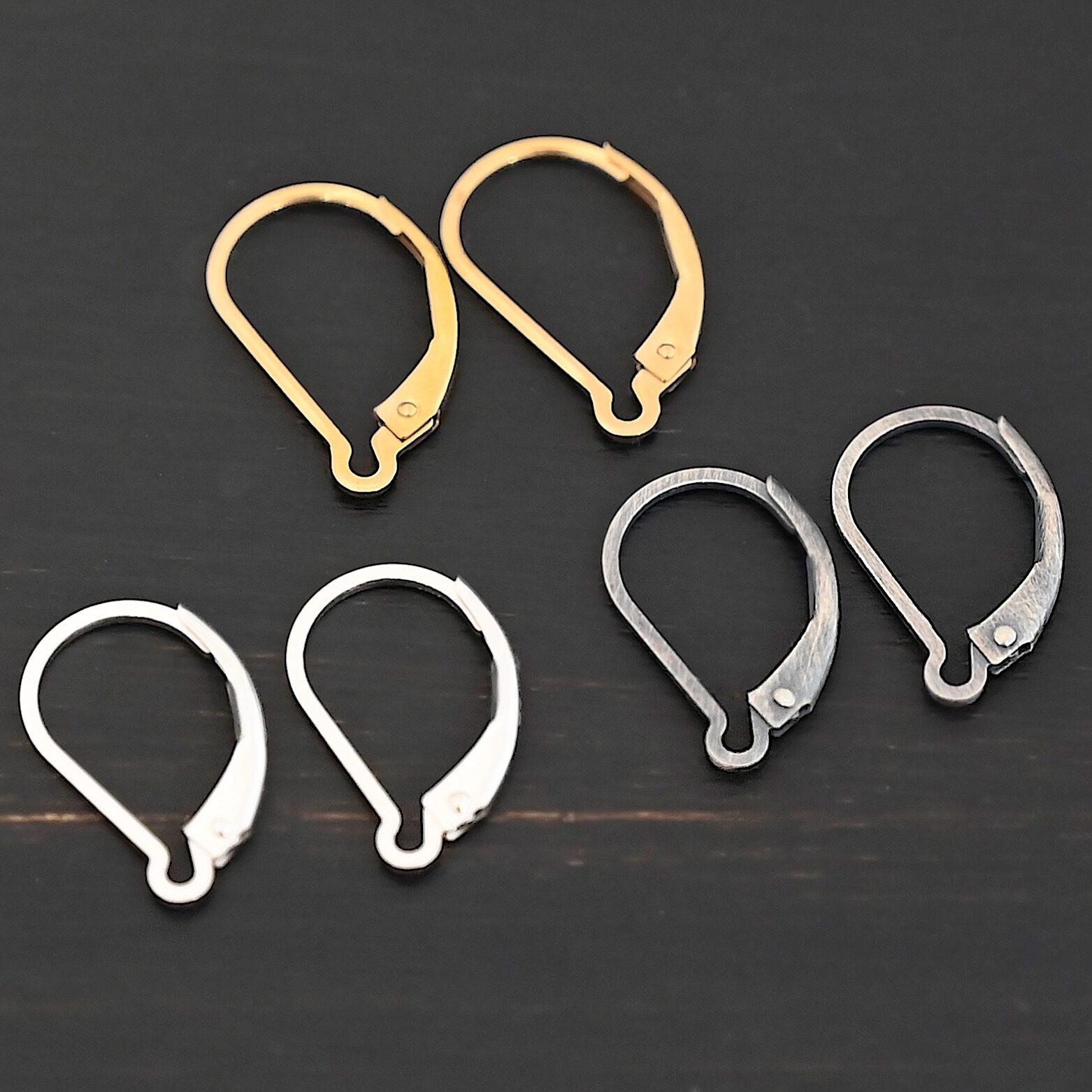 Waverly lever back ear wires - shiny, oxidized, & 14k gold filled shown on dark background