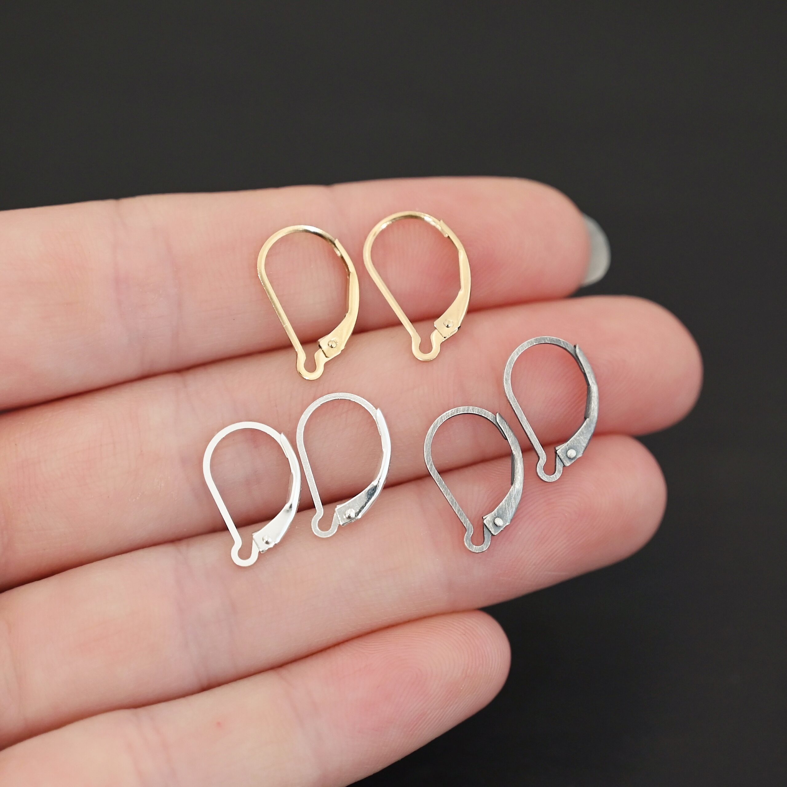 Waverly lever back ear wires - shiny, oxidized, & 14k gold filled shown in hand