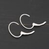 Sterling silver Wren lever back ear wires - shiny, shown on dark background