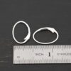 Sterling silver Wren lever back ear wires - shiny, shown by ruler