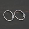 Sterling silver Wren lever back ear wires - oxidized, shown on dark background