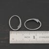 Sterling silver Wren lever back ear wires - oxidized, shown by ruler