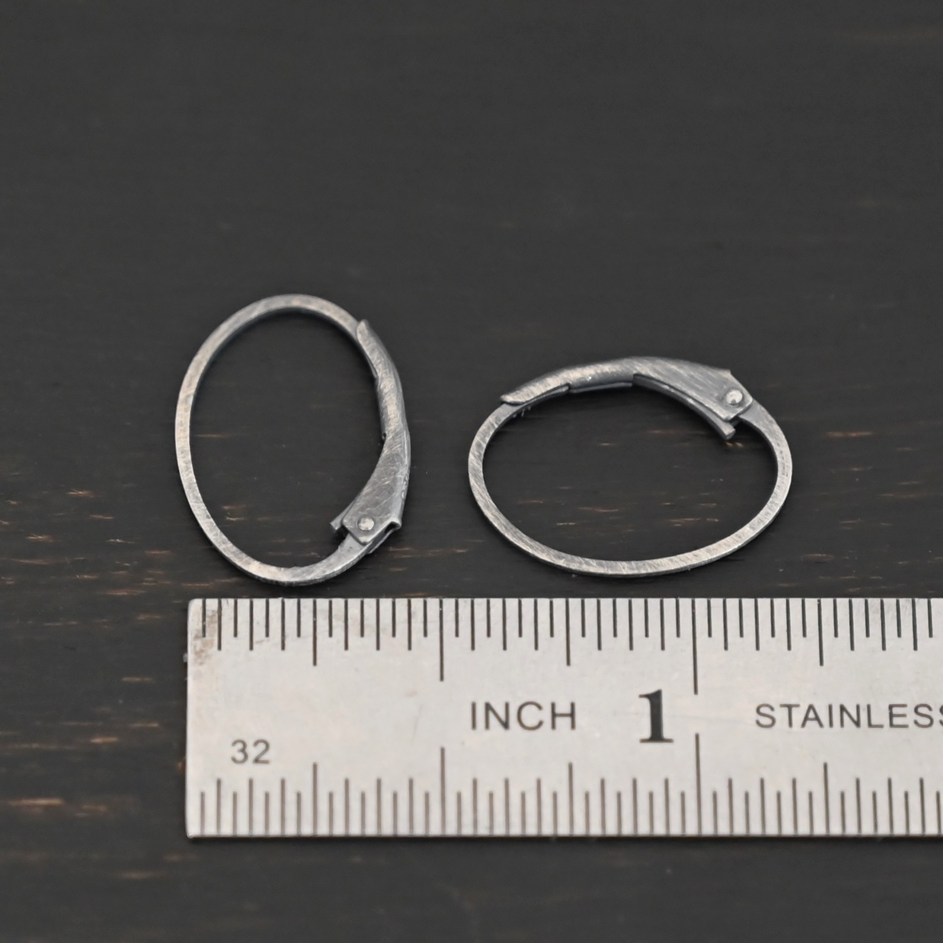 Wren leverback ear wires - oxidized Sterling silver Wren lever back ear wires - oxidized, shown by ruler