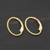 14k gold filled Wren lever back ear wires shown on dark background