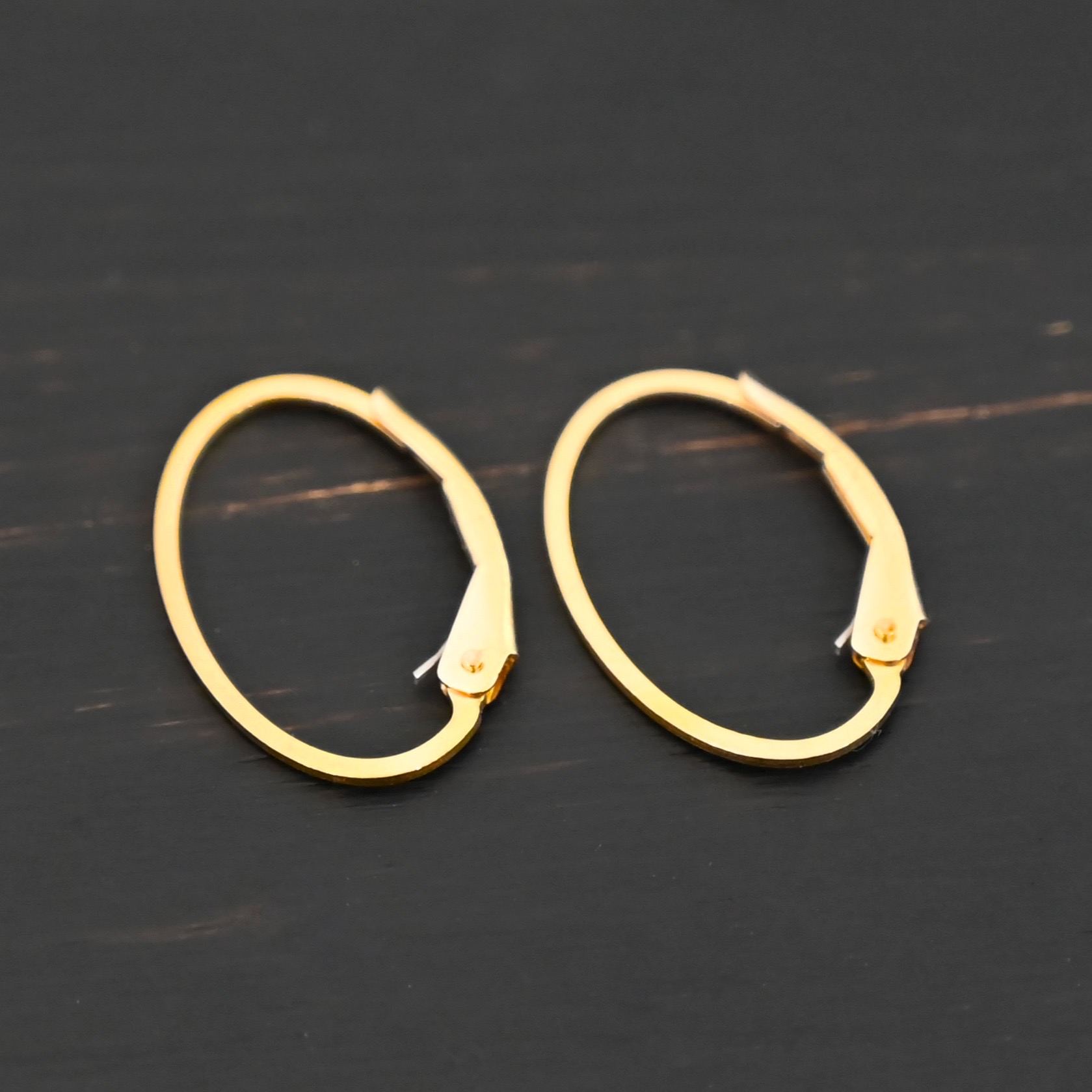 14k gold filled Wren lever back ear wires 14k gold filled Wren lever back ear wires shown on dark background
