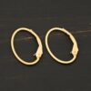 14k gold filled Wren lever back ear wires shown on dark background