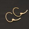 14k gold filled Wren lever back ear wires shown on dark background