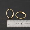 14k gold filled Wren lever back ear wires shown by ruler