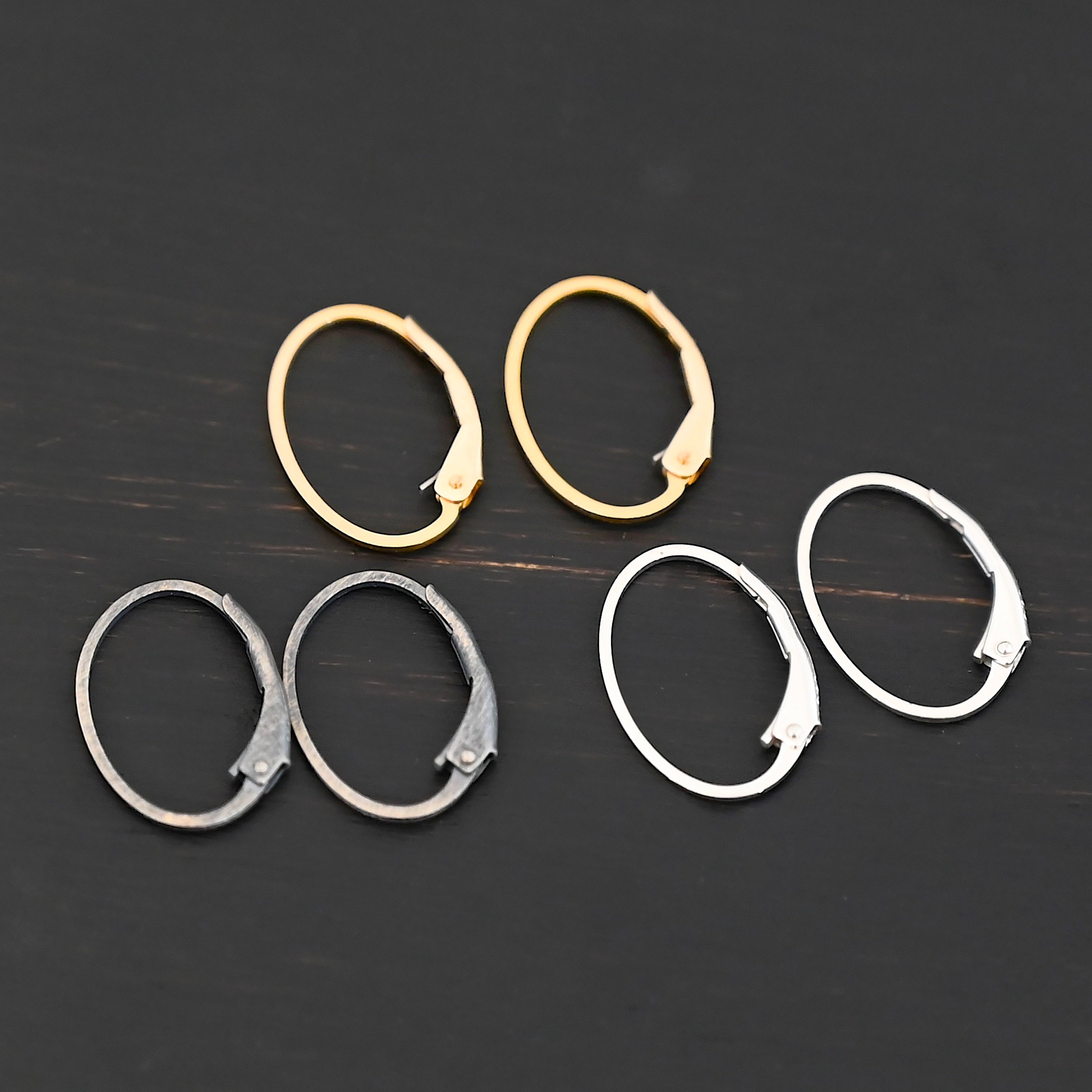 Wren lever back ear wires Wren lever back ear wires - 14k gold filled, shiny, or oxidized shown on dark background