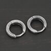 sterling silver Winona Huggie Hoop Earrings - oxidized shown on dark background