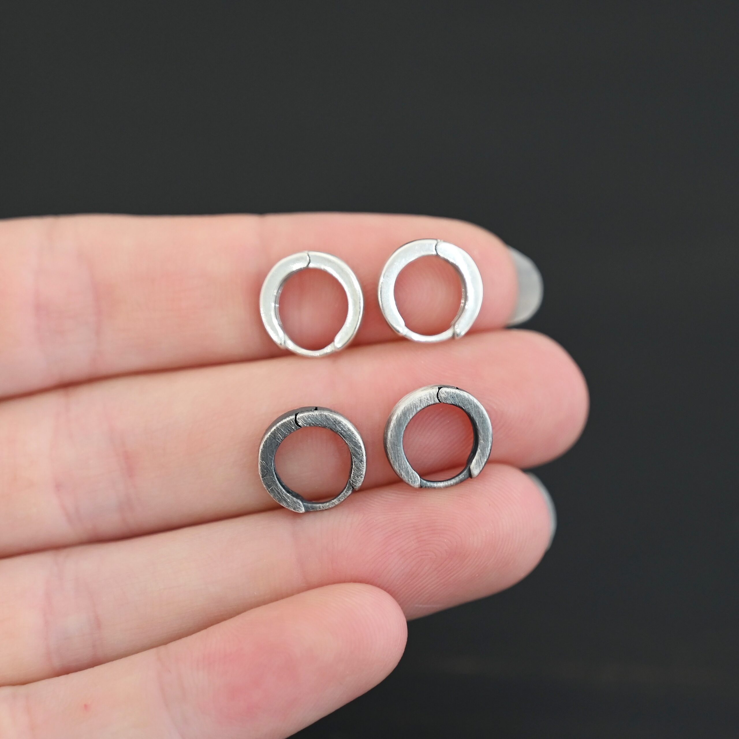 Winona Huggie Hoop Earring sterling silver Winona Huggie Hoop Earrings - oxidized & shiny shown in had