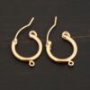 West 14k gold filled hoops shown on dark background