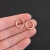 West 14k gold filled hoops shown in hand