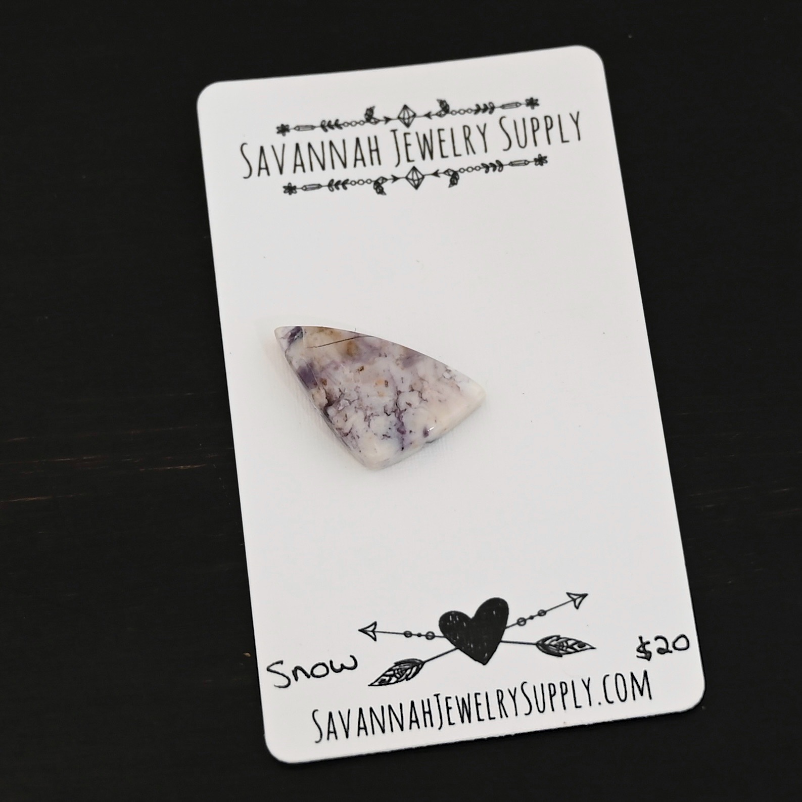 Snow Victoria Cabochon Snow Victoria Cabochon shown on business card