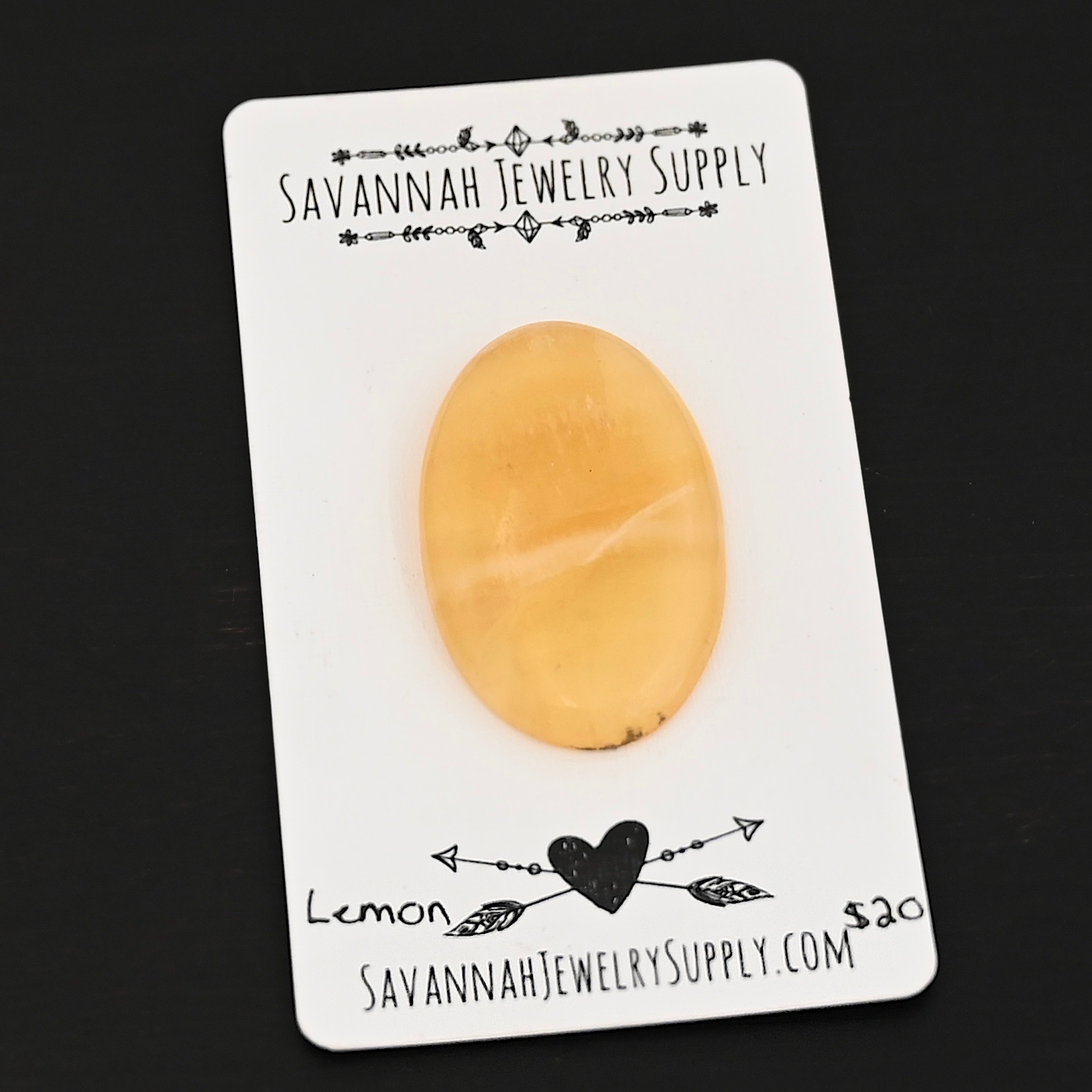 Lemon Calcetite Cabochon Lemon Calcetite Cabochon shown on business card