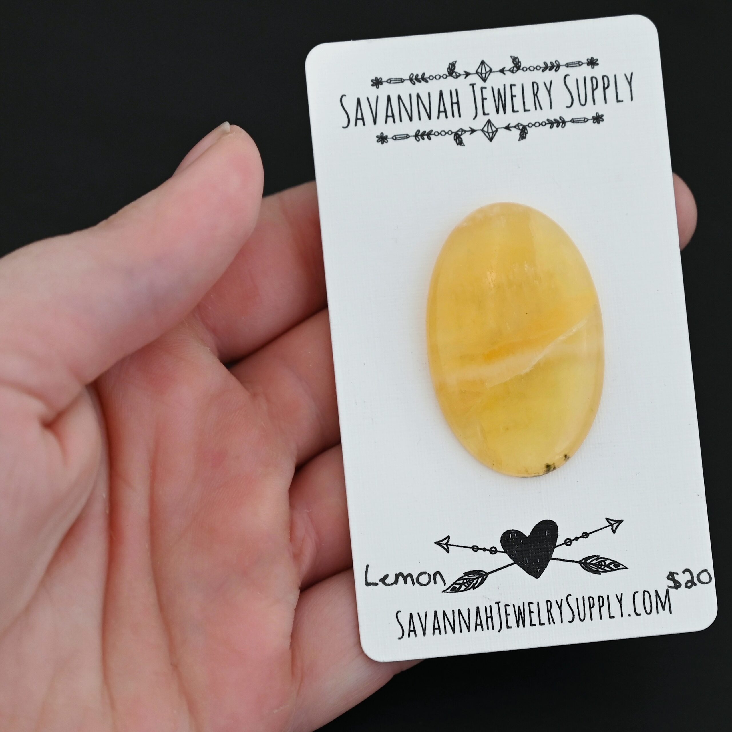 Lemon Calcetite Cabochon Lemon Calcetite Cabochon shown in hand