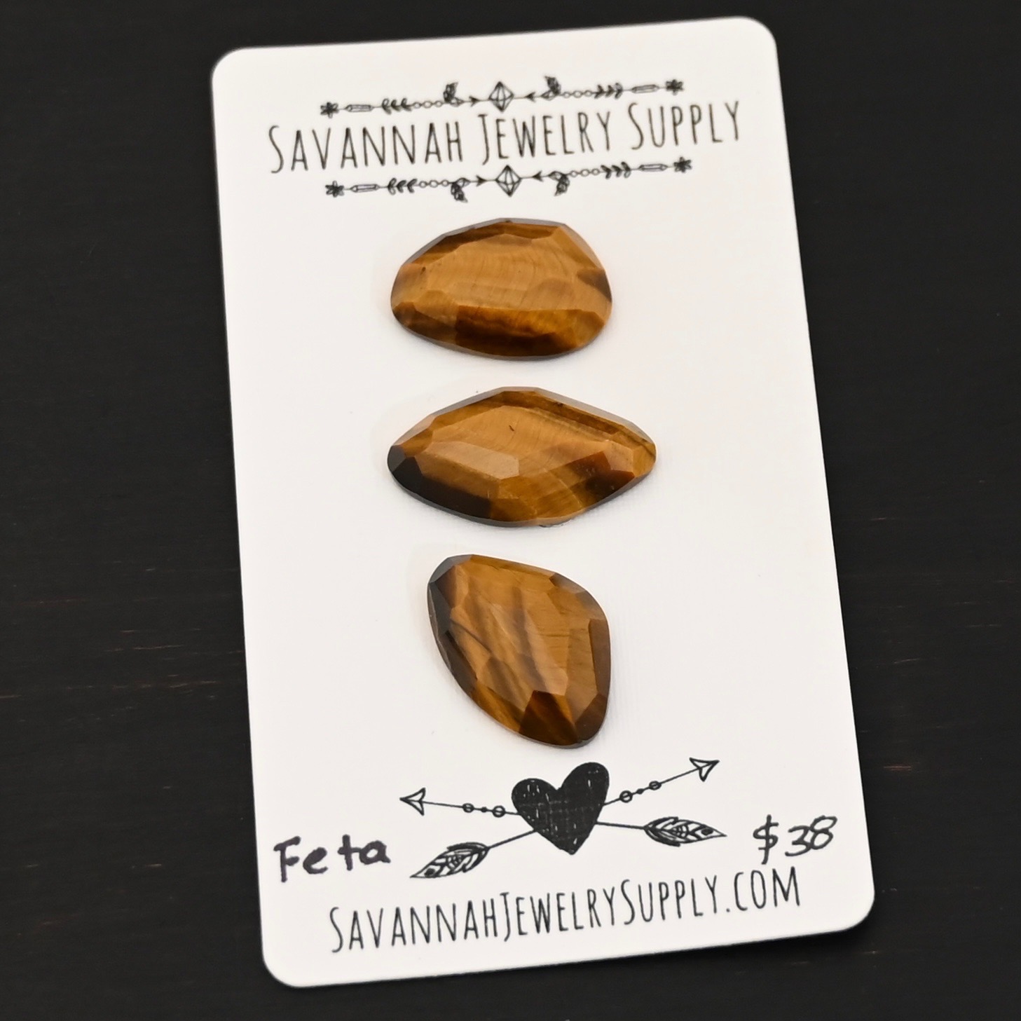 Feta Rosecut Tiger Eye Cabochon Parcel Feta Rosecut Tiger Eye Cabochon Parcel shown on business card