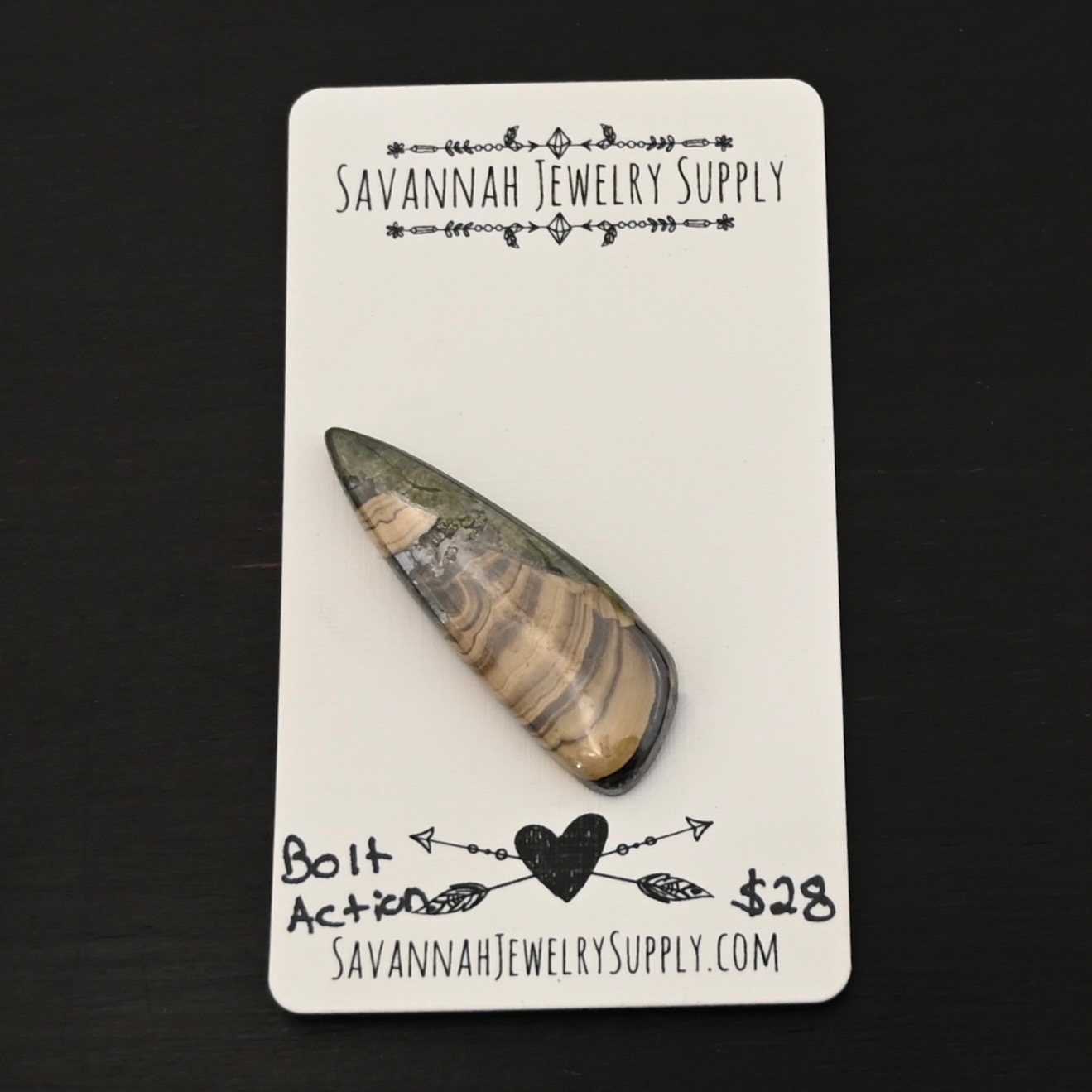 Bolt Action Challe Blonde Cabochon Bolt Action Challe Blonde Cabochon shown on business card