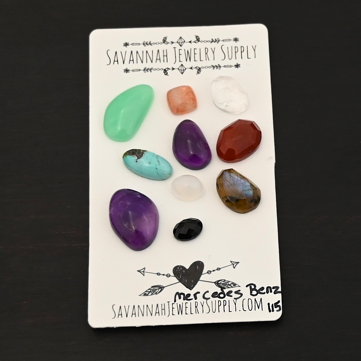 Mercedes Benz Rainbow Cabochon Parcel shown on business card