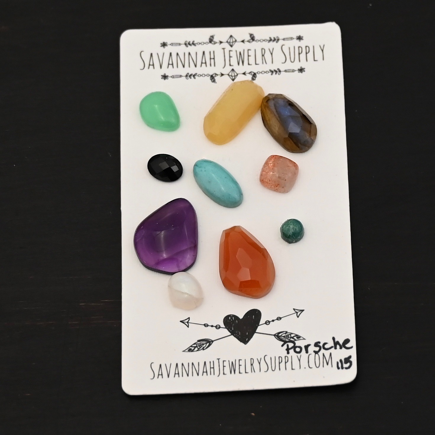 Porsche Rainbow Cabochon Parcel shown on business card