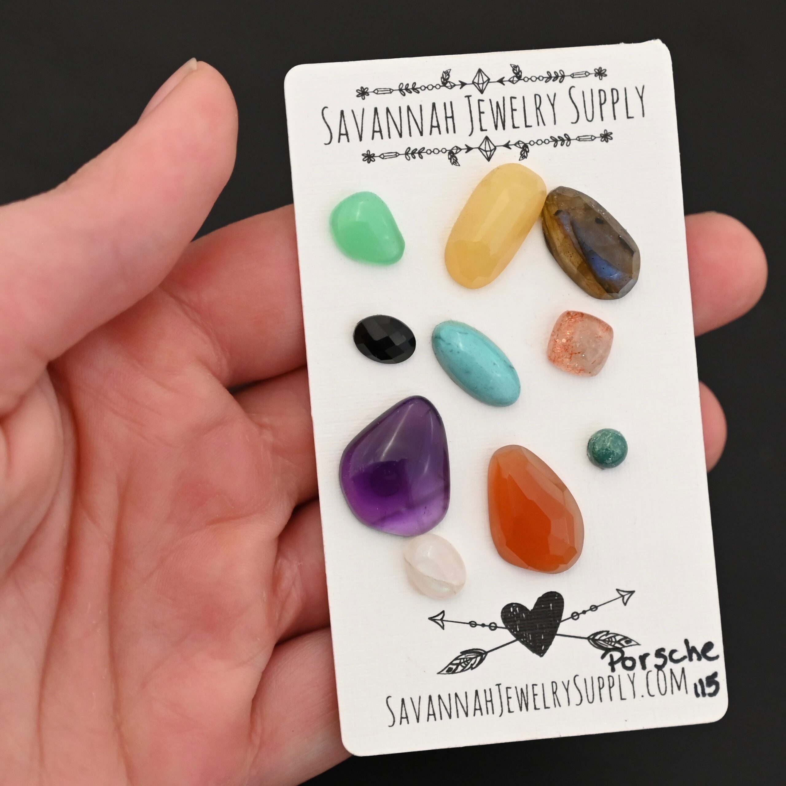 Porsche Rainbow Cabochon Parcel shown in hand