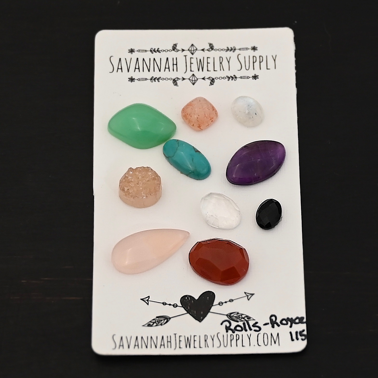 Rolls-Royce Rainbow Cabochon Parcel shown on business card