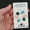 Silverado Rainbow Cabochon Parcel shown in hand