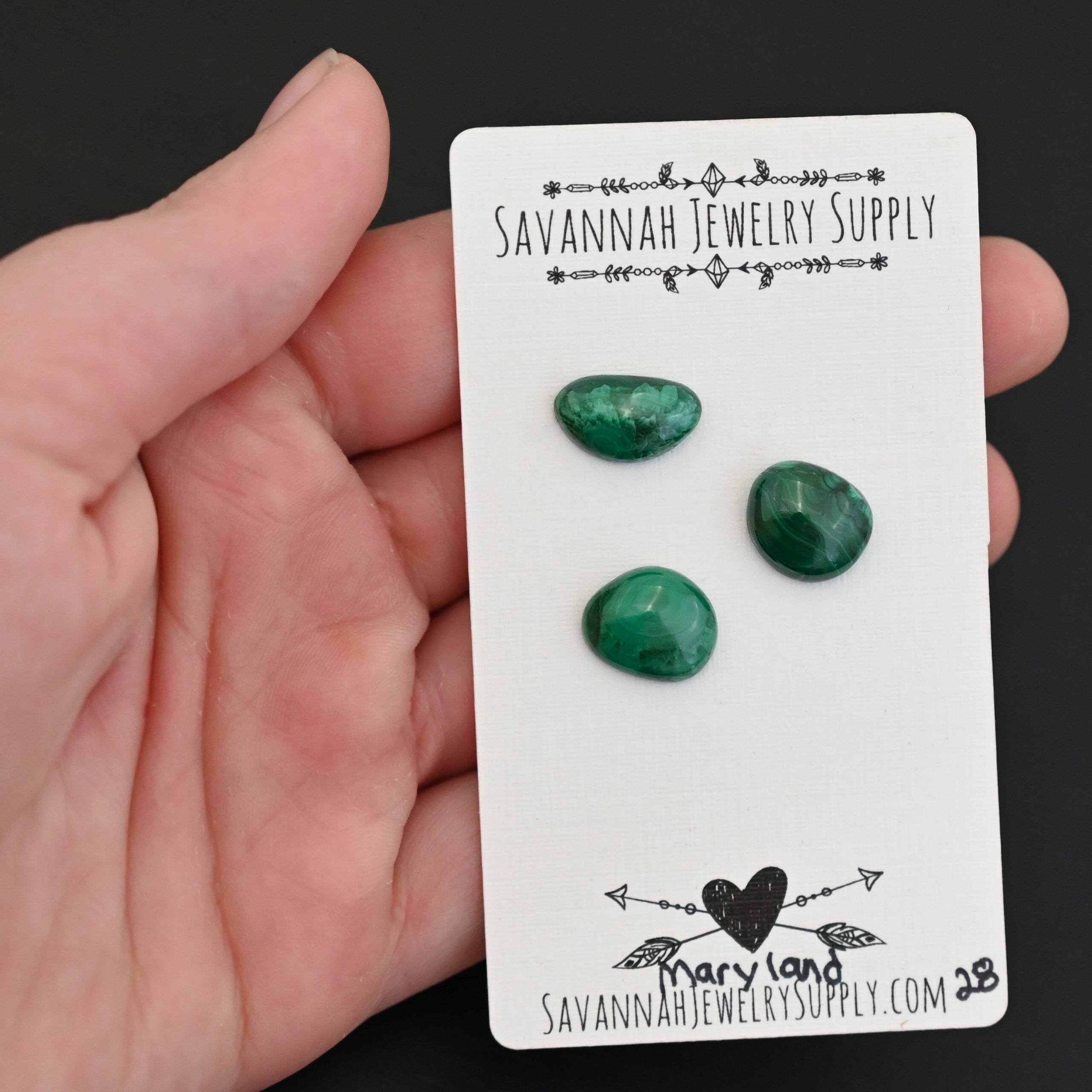 Maryland Malachite Cabochon Parcel shown in hand