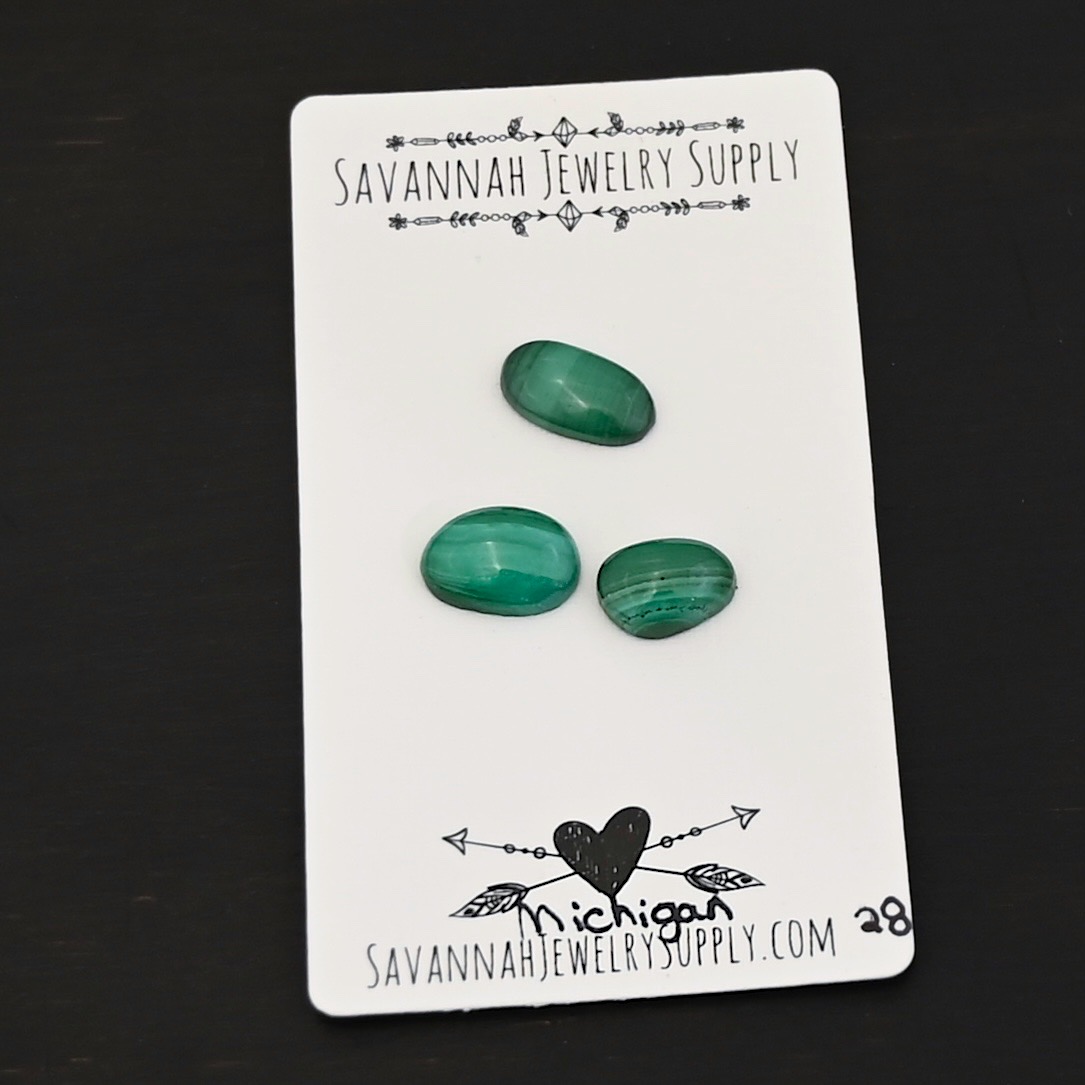 Michigan Malachite Cabochon Parcel Michigan Malachite Cabochon Parcel shown on business card